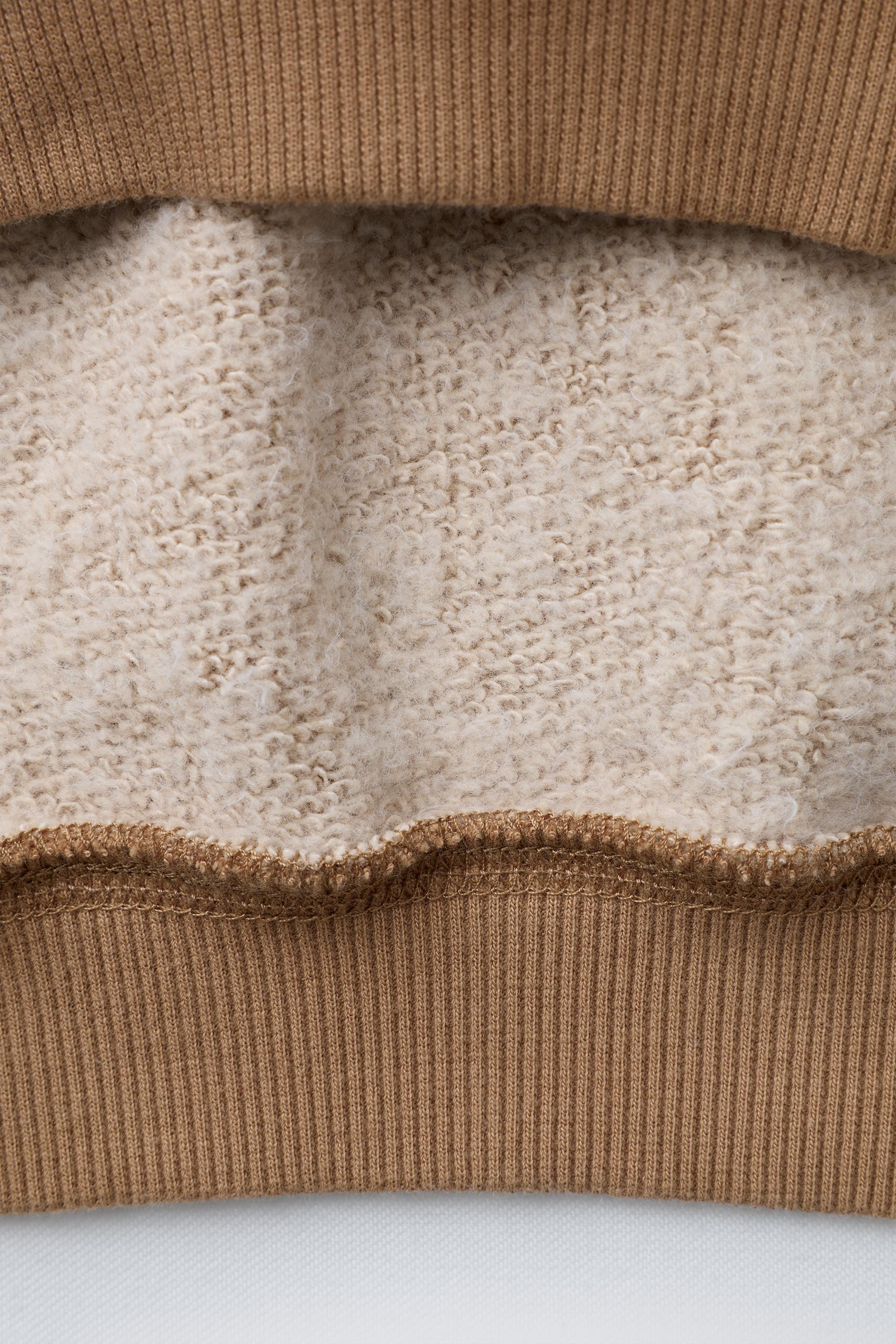 RAGLAN SLEEVE SWEATSHIRT